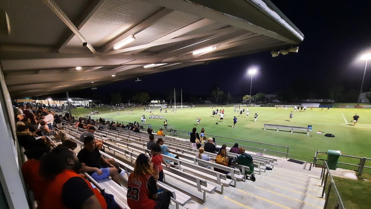 The crowd watches the kids having fun on the field at halftime in the inaugural Ipswich Indigenous v Ipswich All Stars rugby league match at the North Ipswich Reserve. Picture: David Lems