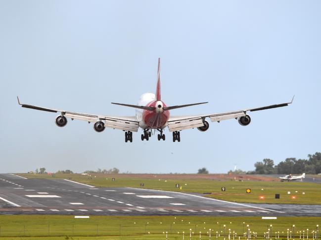 Coronavirus evacuees arriving at Darwin International Airport. Picture: Che Chorley