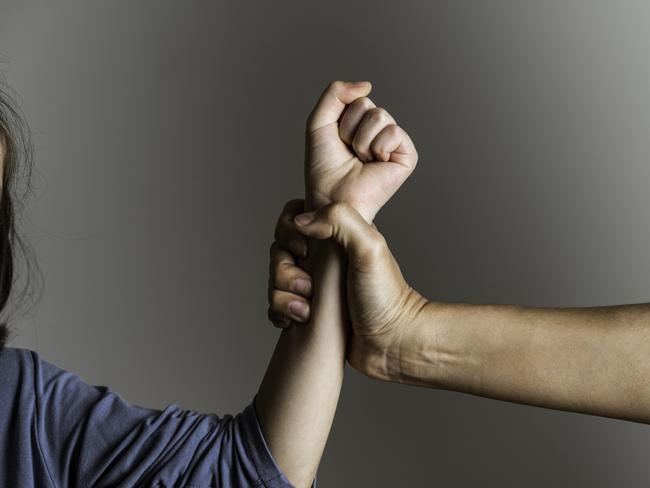 istock generic:  woman, abuse, DV, domestic violence, harassment, sexual harassment.   Parent is holding her little girls arm and is about to use violence. Representing child abuse and domestic violence. . Picture: istock