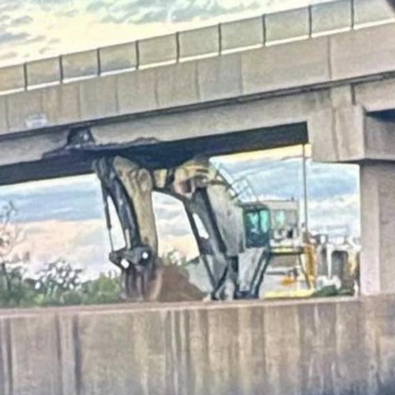 Peak Downs Highway shut after digger stuck under bridge at Caval Ridge ...