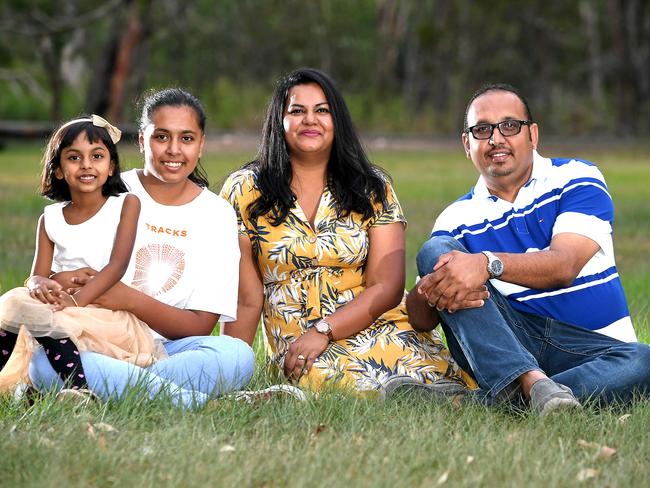 Rashik and Ravnita Lal with kids Rasha age 15 and Riya age 5 at here home in Kingston.The family have purchased land at Carver’s Reach in Park Ridge. When built will become his family’s home.Thursday January 9, 2020. (AAP image, John Gass)