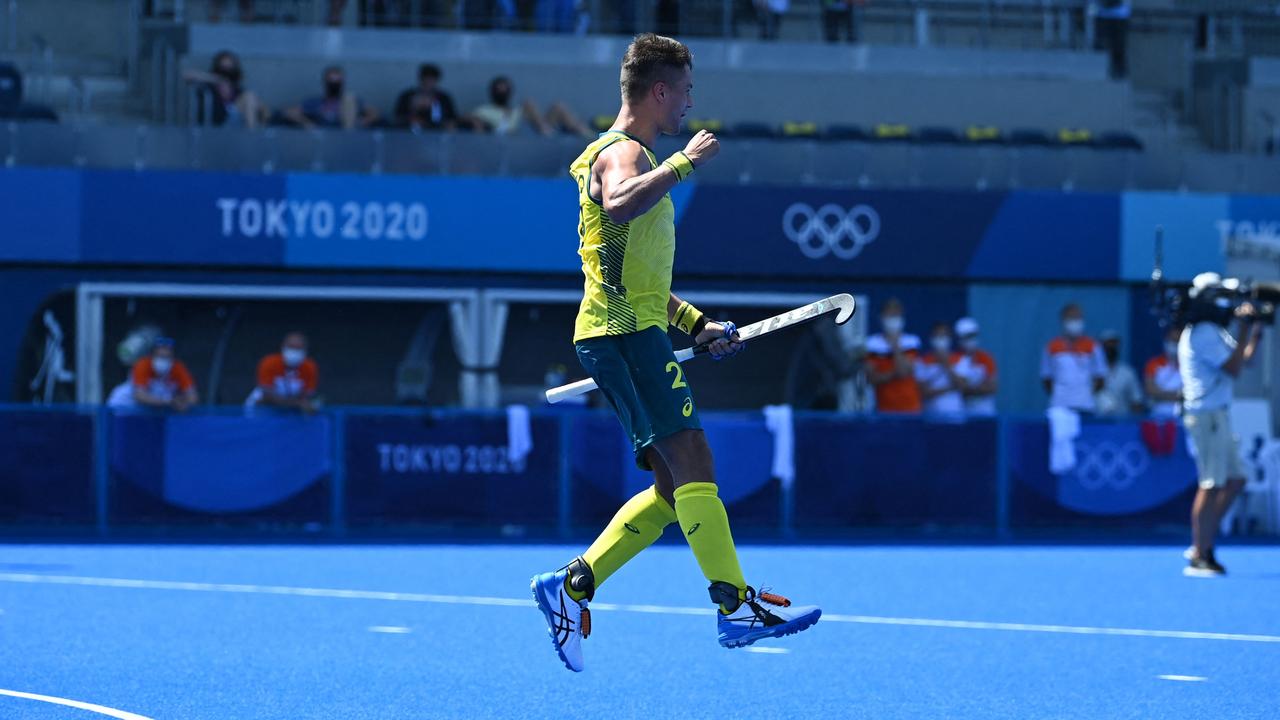 Australia's Tim Brand celebrates after scoring the winning penalty at Oi Hockey Stadium. Photo: AFP