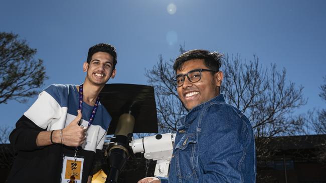 Anshul Vasishth (left) and Adhith Sivaharen after looking at the sun through a telescope at the iLaunch Space family fun day, part of UniSQ's Open Day, Sunday, August 18, 2024. Picture: Kevin Farmer