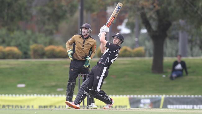 Adelaide University’s Sam Kerber in action. Kerber is ranked No. 1 in the top 10 Premier Cricket performers so far this season. Picture: Dean Martin