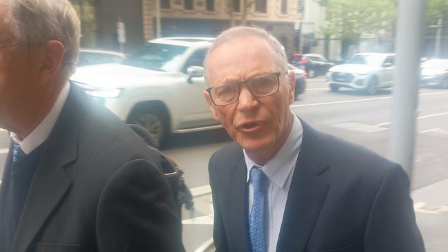 Former professor of neurosurgery Andrew Kaye, 74, leaves the Victorian Civil and Administrative Tribunal.