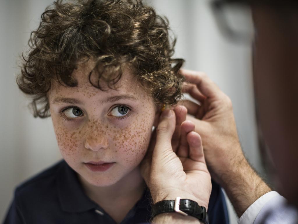 Young having his ears checked