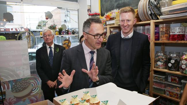 Greens candidate for Higgins Jason Ball, right, pictured with Greens candidate for Kooyong Julian Burnside, left, and Greens leader Richard Di Natale. Picture: AAP