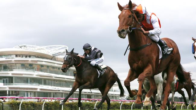 Damien Oliver pilot Lycurgus to victory in the High Country Handicap at Flemington. Picture: AAP