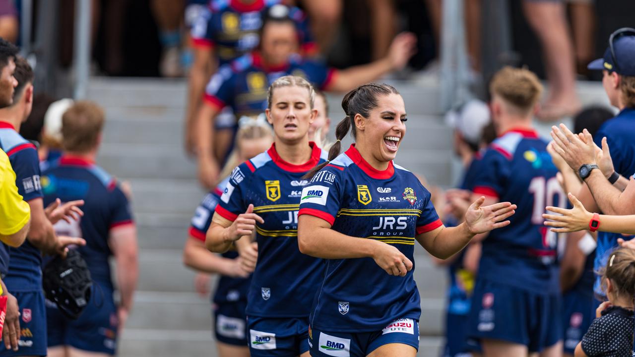 Tara Reinke and Shenae Ciesiolka lead the Western Clydesdales BMD Premiership side out for their clash against the Brisbane Tigers. Picture: Benny Hassum Photography.