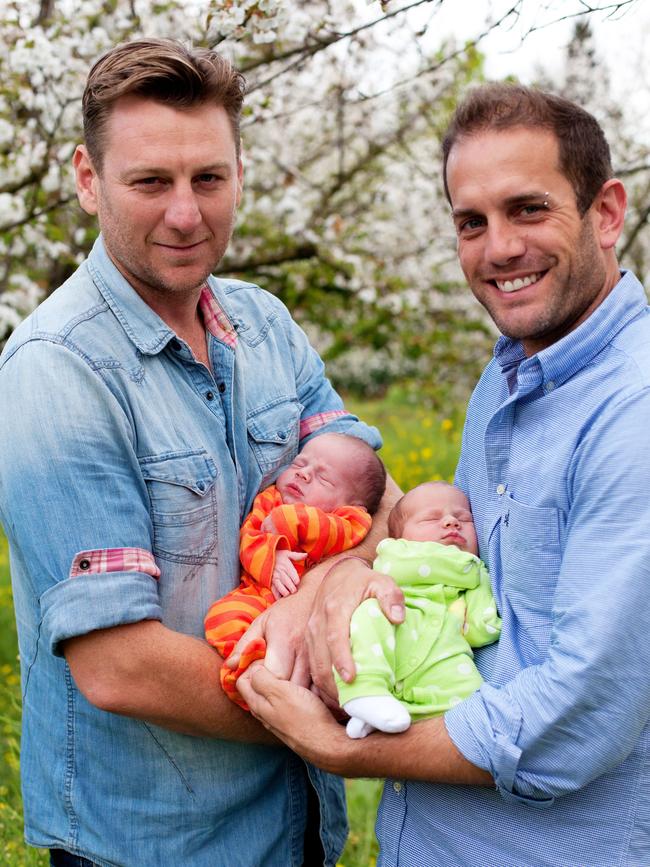 Toby Allen with partner Darren and their surrogate twins Harvey and Roxanne.