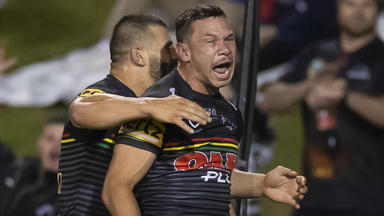 Brent Naden of the Panthers celebrates after scoring a try against the Roosters. (AAP Image/Craig Golding)