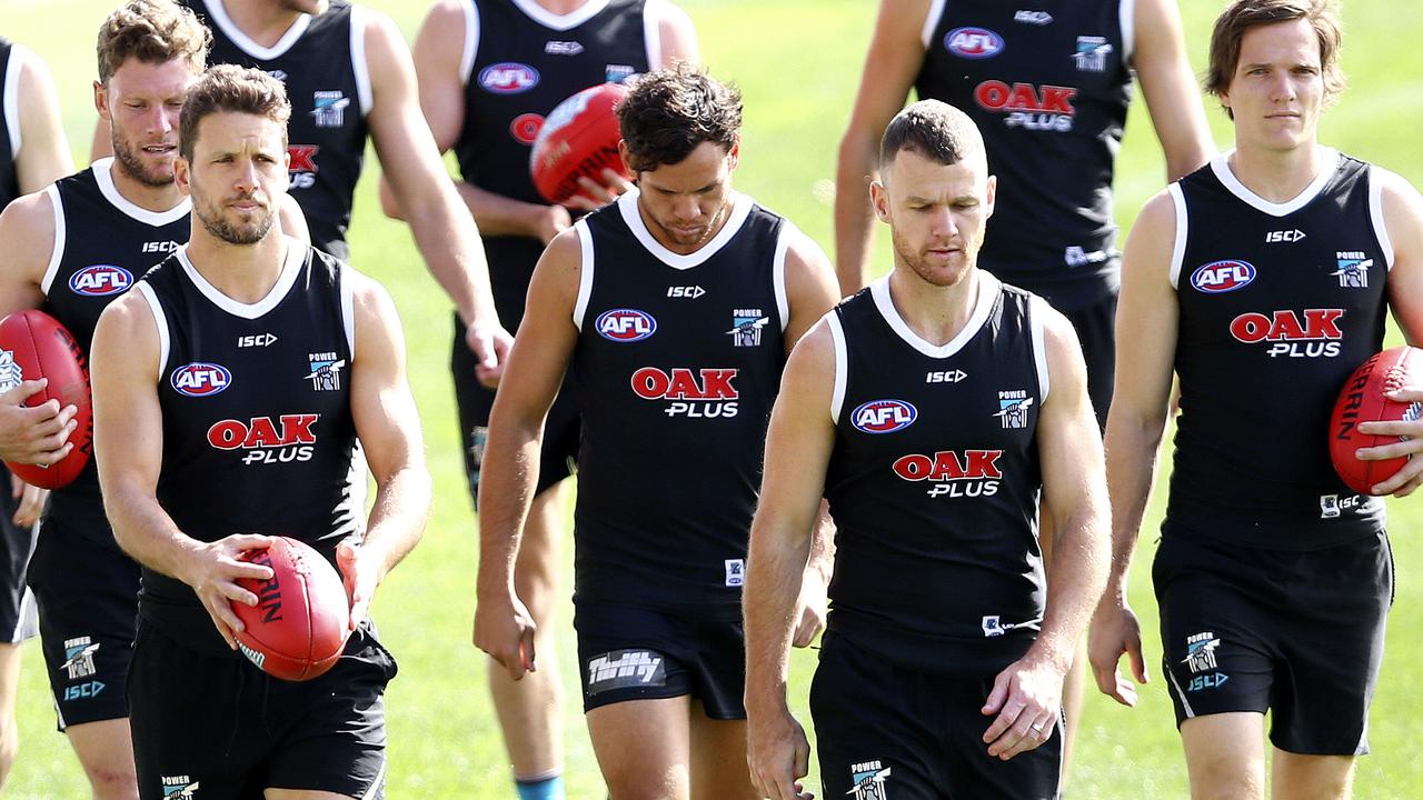 Power skipper Travis Boak and star midfielder Robbie Gray lead the way at training. Picture: Sarah Reed