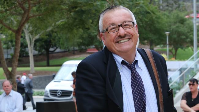 Roger Munro leaves Brisbane Supreme Court.