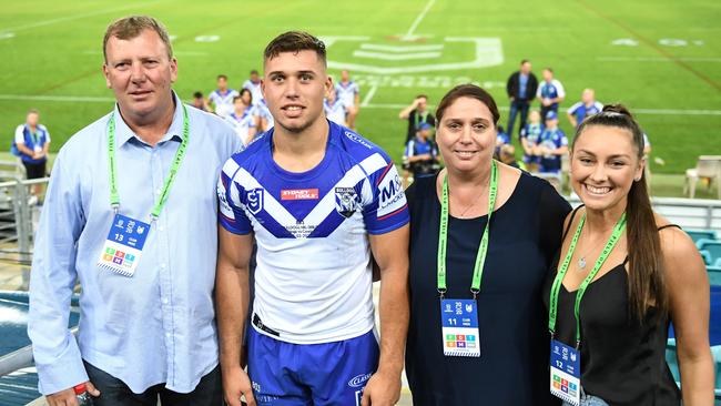 Averillo with his family after the round two game against the Cowboys.