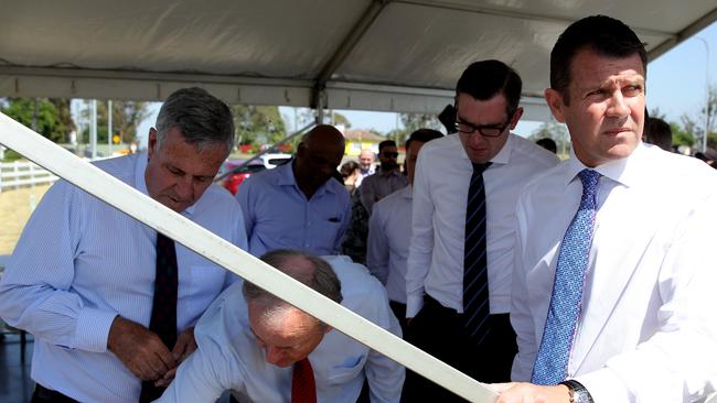 Premier Mike Baird, right, officially opening the upgrade.