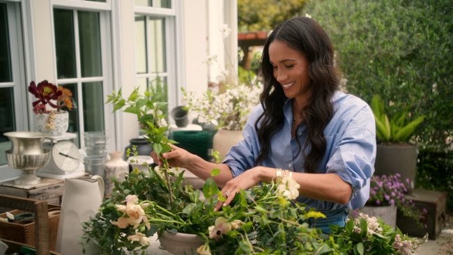 Making a fancy arrangement out of supermarket flowers. Image: Netflix