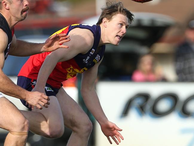 Joshua Wallace of Diggers Rest (right) contests with Jake Safstrom of Riddell during RDFL footy: Diggers Rest v Riddell on Saturday, July 6, 2019, in Diggers Rest, Victoria, Australia. Picture: Hamish Blair