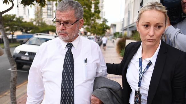 Engineering consultant Thomas Polley (left) leaving the inquest into the Dreamworld tragedy with Detective Sergeant Nicola Brown, who investigated the incident. Picture: AAP