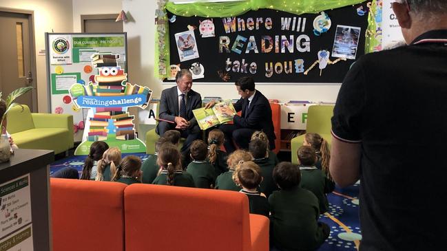 Premier David Crisafulli and Education Minister John-Paul Langbroek read Bluey to primary students at Carbrook State School at the launch of the Premier’s Reading Challenge 2025. Picture: Judith Kerr