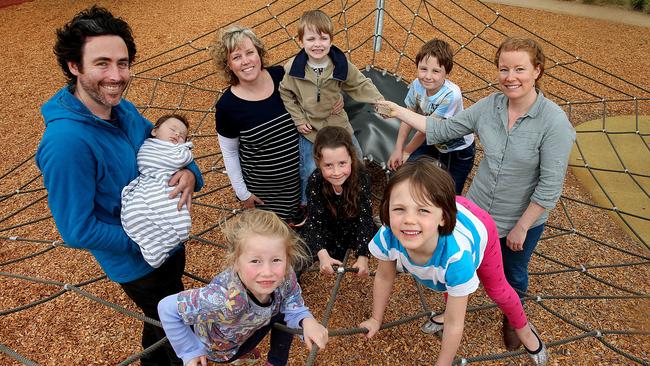 The Heidelberg Good Karma Network is a Facebook group set up to spread good in the community. Peter Castaldo with baby Arthur, Tomi Redman, Jess Redman with children Annika and Sophie, Hugh, Elena, and Alec at Possum Hollow Park in Heidelberg. Picture: Ian Currie