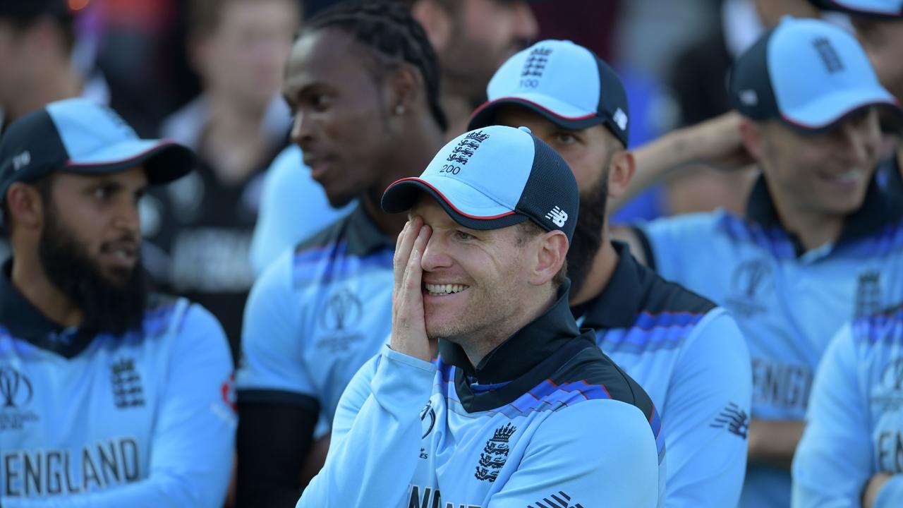 England's captain Eoin Morgan enjoys a lighter moment. (Photo by Dibyangshu Sarkar / AFP)