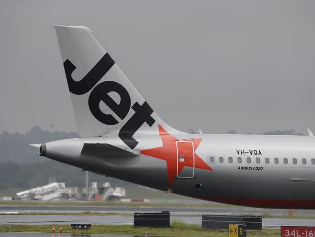 SYDNEY, AUSTRALIA - NewsWire Photos February 25, 2021: QANTAS has reported losses of around 1 billion dollars over the last year, counting the financial cost of Covid-19 on the airline. Jetstar planes are pictured at Sydney airport today. Picture: NCA NewsWire / David Swift