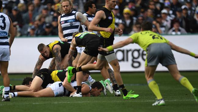 Richmond is awarded a holding the ball free kick, but the Cats won 11 more frees for the game. Picture: AAP