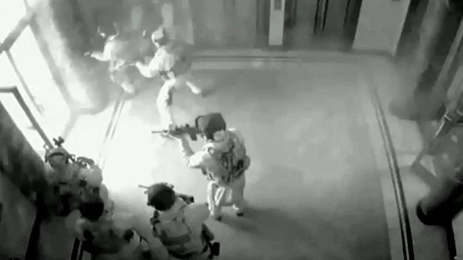 CCTV showing the moment the tactical operations unit storm the Lindt cafe in Martin Place killing Man Haron Monis.