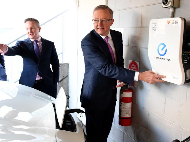 Chris Bowen and Anthony Albanese alongside an electric car. Picture: NCA NewsWire / Jeremy Piper