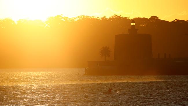 Sunrise over Sydney on a cool, crisp morning. Picture: Toby Zerna