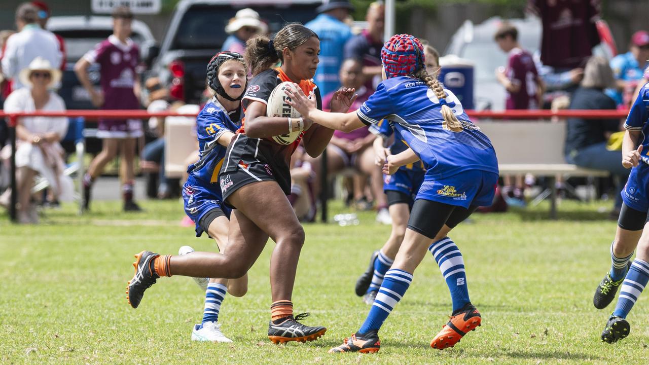 Georgie Pengilly takes on the South Burnett Eagles line during a 2024 Walker Weekend Challenge match. Picture: Kevin Farmer