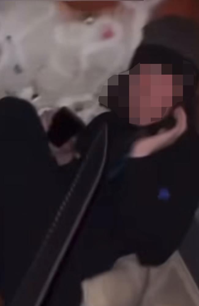 One victim is threatened with a machete. Picture: Instagram
