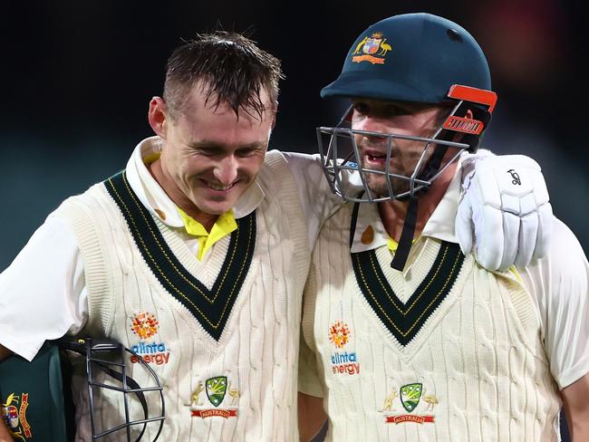 ADELAIDE, AUSTRALIA - DECEMBER 08: Marnus Labuschagne and Travis Head of Australia walk from the field at the end of play during day one of the Second Test Match in the series between Australia and the West Indies at Adelaide Oval on December 08, 2022 in Adelaide, Australia. (Photo by Chris Hyde/Getty Images)