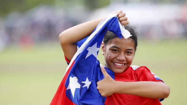 Ve'a Tavita proudly wears the Samoan flag during the Pasifika Cup. Picture: John Appleyard