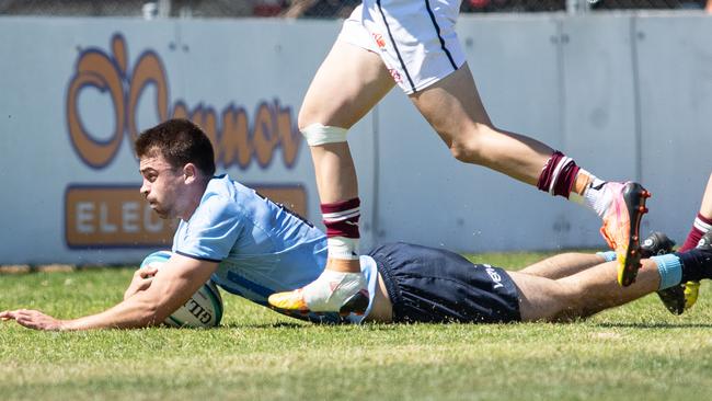 Archie Saunders scores a try. Picture: Julian Andrews