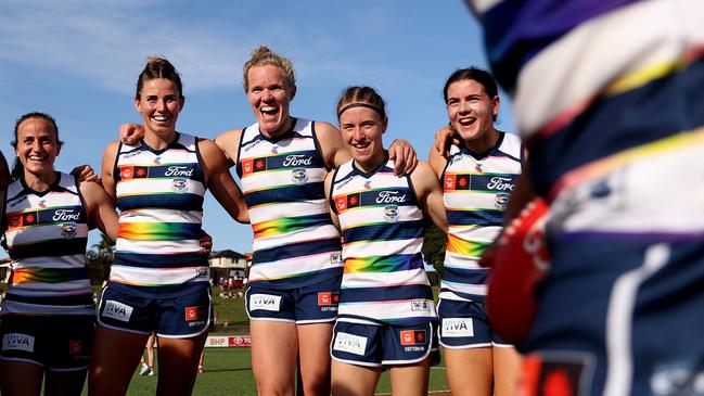 SYDNEY, AUSTRALIA - OCTOBER 06: Cats players celebrate at full-time during the round six AFLW match between Sydney Swans and Geelong Cats at Henson Park, on October 06, 2024, in Sydney, Australia. (Photo by Brendon Thorne/AFL Photos/via Getty Images)