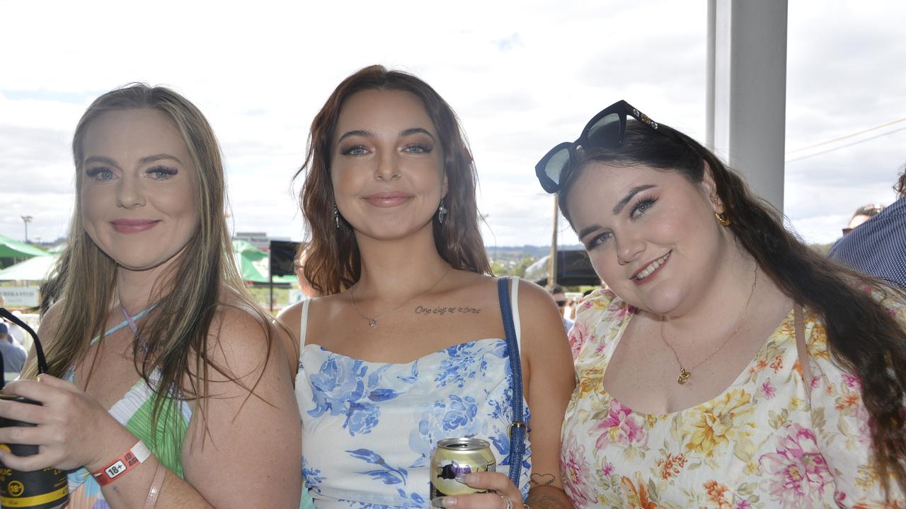 Dimity Hohn, Georgia Hanrahan and Maddy Lowns at the 2023 Audi Centre Toowoomba Weetwood race day at Clifford Park Racecourse.