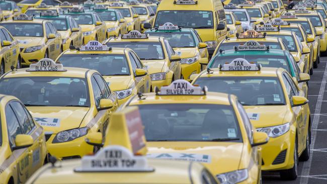 Travellers face being slugged higher fees for hailing taxis at Melbourne airport. Picture: Jason Edwards