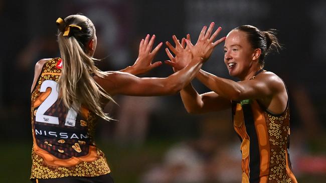 CAIRNS, AUSTRALIA - OCTOBER 24: Jasmine Fleming of the Hawks celebrates kicking a goal during the round nine AFLW match between Hawthorn Hawks and Narrm (Melbourne Demons) at Cazaly's Stadium, on October 24, 2024, in Cairns, Australia. (Photo by Albert Perez/AFL Photos via Getty Images)