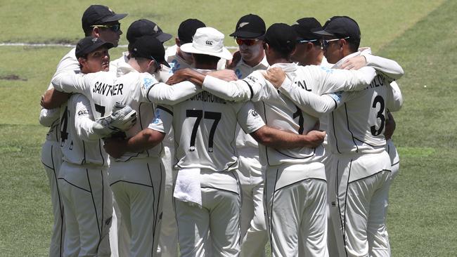 The New Zealand team huddle up before play. Picture: AP