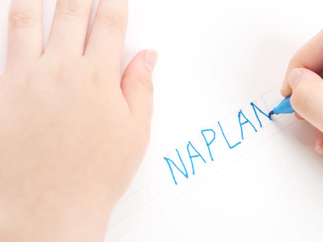 Naplan is an Australian Standardised Test that most school children go through. In this image, preschool child tracing the word NAPLAN. Font used for tracing is my own design,