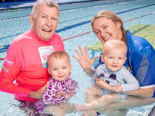 Ex-Olympic swimming coach and Kids Alive founder Laurie Lawrence with Kate Simpson, mother to two 18-month-old twins.