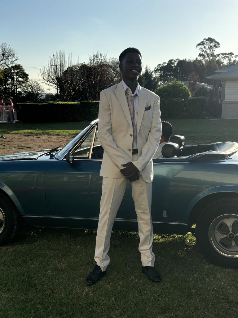 Ian Gakuo arrives at Kingaroy's St John's Lutheran School formal.