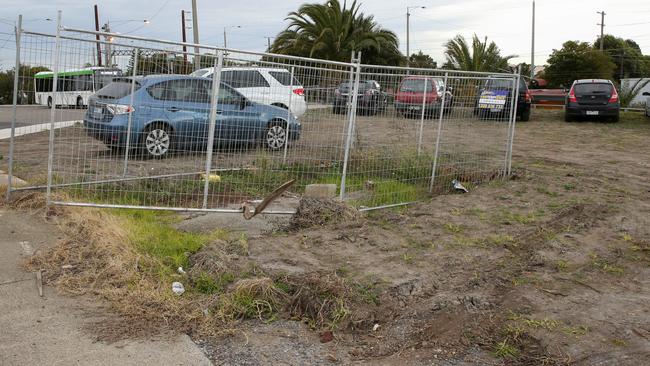 A fenced off area at the muddy carpark. Picture: George Salpigtidis