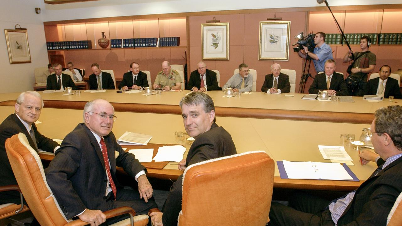 Attorney-general Phillip Ruddock (left), Mr Howard (second from centre) and deputy prime minister John Anderson (centre) and other members of the National Security Committee (NSC), which was Australia’s peak defence and foreign policy decision-making body, responsible for approving Australia’s involvement in Iraq Picture: Auspic / NAA © Commonwealth of Australia, 2004