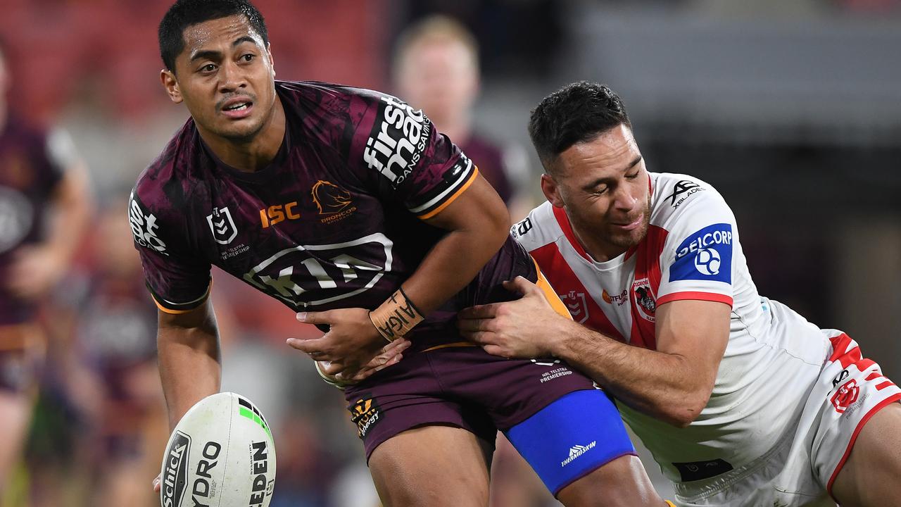 BRISBANE, AUSTRALIA - AUGUST 21: Anthony Milford of the Broncos is tackled by Corey Norman of the Dragons during the round 15 NRL match between the Brisbane Broncos and the St George Illawarra Dragons at Suncorp Stadium on August 21, 2020 in Brisbane, Australia. (Photo by Matt Roberts/Getty Images)