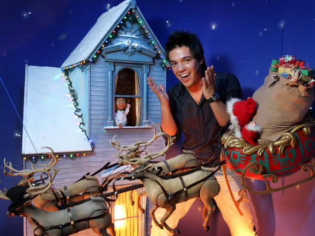 2005: Singer Anthony Callea gets a sneak look at the Myer Christmas windows display, based on James Patterson’s The Santa Kid. Picture. News Limited