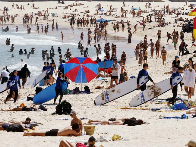 DAILY TELEGRAPH - 26.11.24Sun seekers at Bondi Beach pictured enjoying the surf during a heat wave in Sydney. Picture: Sam Ruttyn