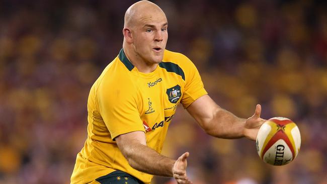 MELBOURNE, AUSTRALIA - JUNE 29: Stephen Moore of the Wallabies passes the ball during game two of the International Test Series between the Australian Wallabies and the British & Irish Lions at Etihad Stadium on June 29, 2013 in Melbourne, Australia. (Photo by David Rogers/Getty Images)