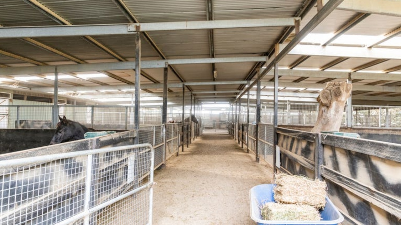 There are three stable blocks with 14 individual stables, seven undercover sand yards and a horse walker.